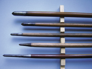 Four early 19th century brazed piles, showing variations in shape