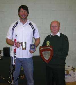 The decision to learn to shoot a recurve was made in order to force John to focus on the mechanics, and not the medals 