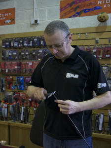 County Durham store manager Alan Kirkup builds some arrows for a customer