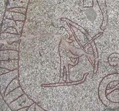 Ullr, the Norse god of winter and hunting, depicted on skis with a bow on the Böksta runestone near Balingsta, Sweden